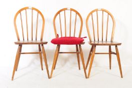 TWO MID 20TH CENTURY BEECH KITCHEN CHAIRS - MANNER OF ERCOL