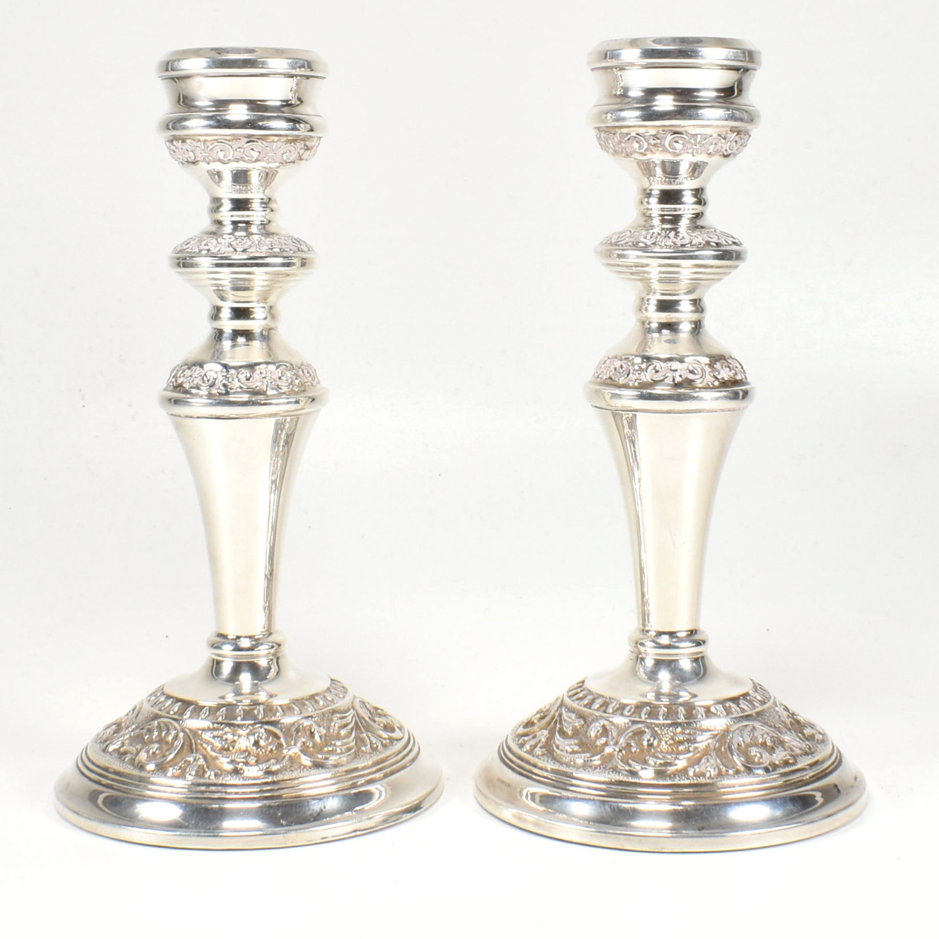 PAIR OF 1970S HALLMARKED SILVER MOUNTED CANDLESTICKS
