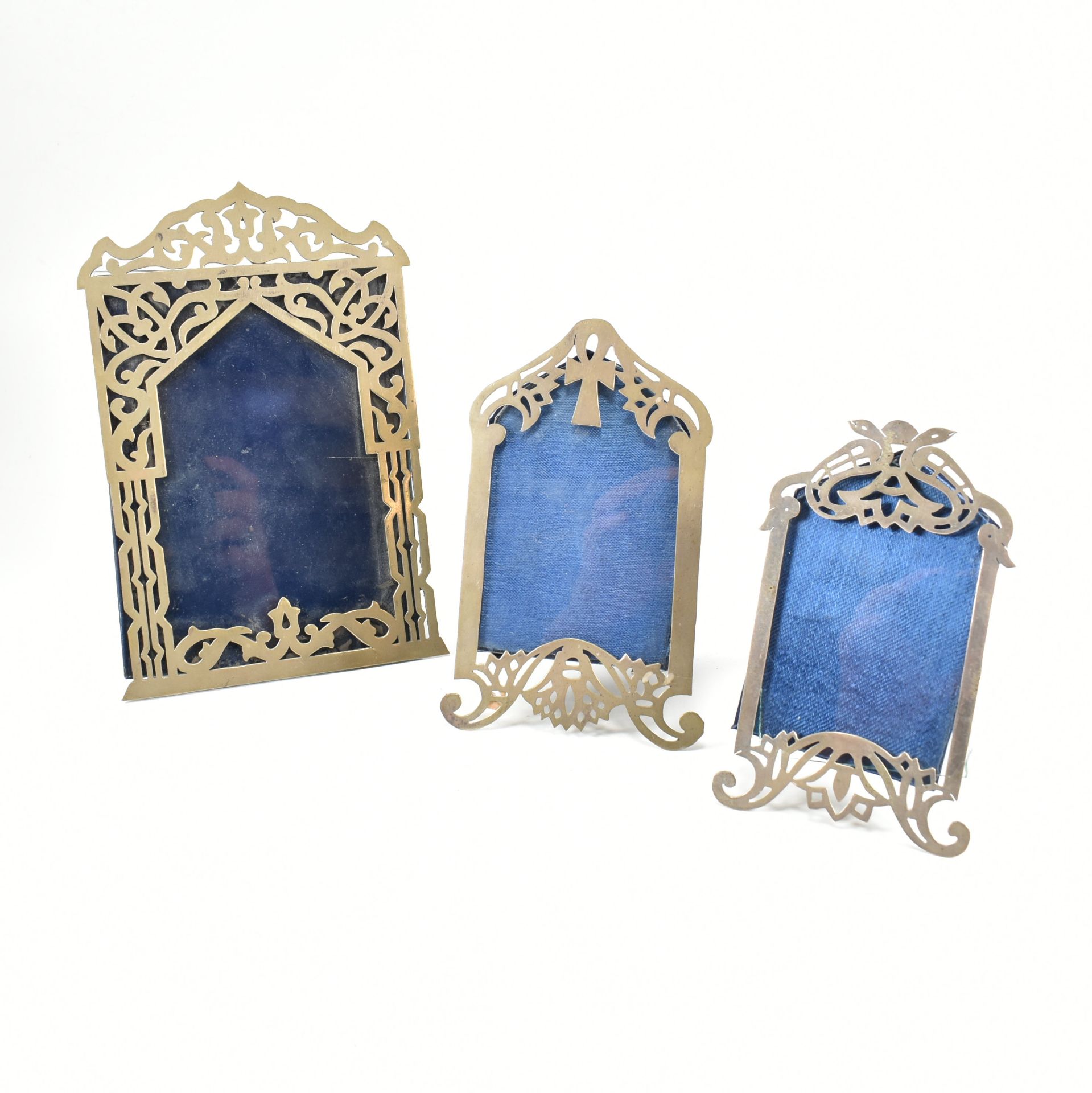 THREE EGYPTIAN SILVER FRONTED PICTURE FRAMES