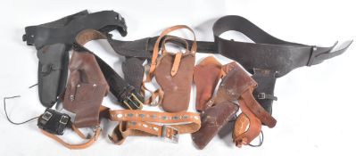 COLLECTION OF ASSORTED LEATHER GUN HOLSTERS