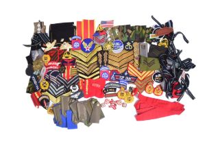 COLLECTION OF ASSORTED MILITARY CLOTH OACTHES