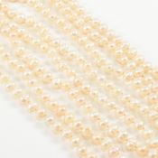 TWO STRING OF CULTURED BAROQUE PEARLS