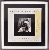 PAUL & LINDA MCCARTNEY - DUAL AUTOGRAPHED 'SIXTIES' BOOK