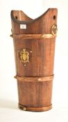 EARLY 20TH CENTURY OAK STAVED UMBRELLA ARMORIAL STICK STAND