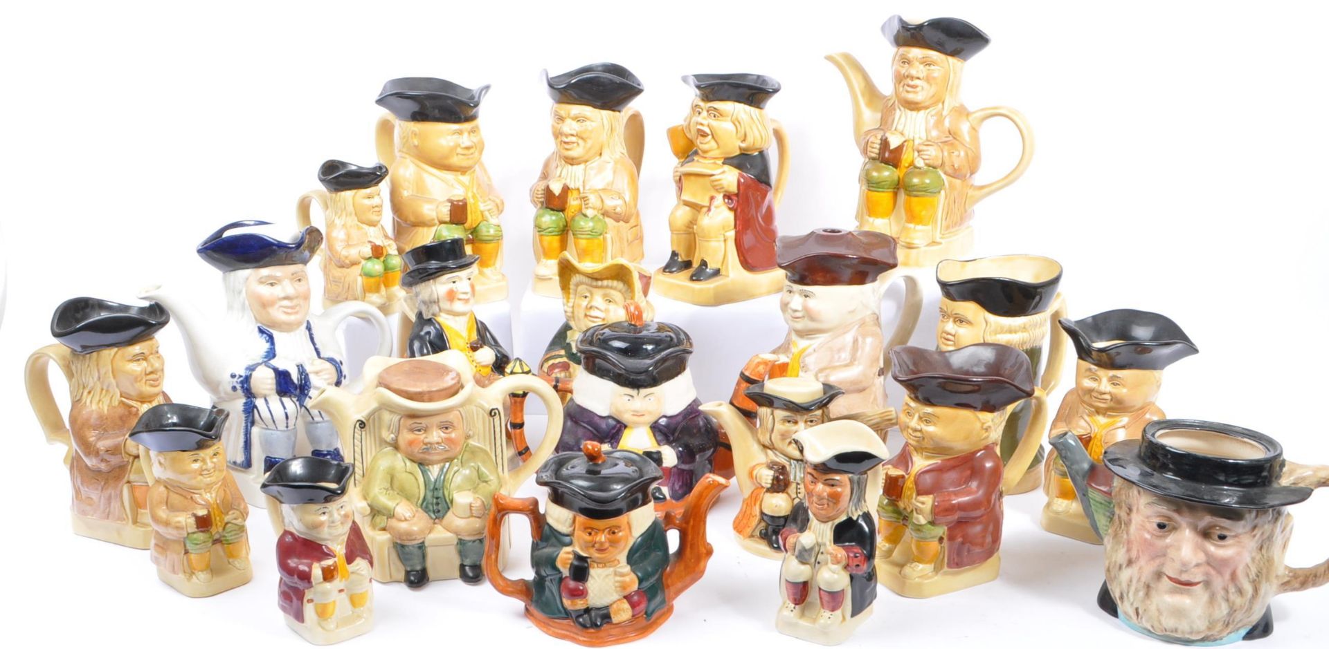 COLLECTION OF TWENTY ONE 20TH CENTURY CERAMIC TOBY JUGS