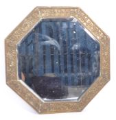 EARLY 20TH CENTURY REPOUSSE BRASS WALL MIRROR