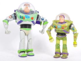 TWO VINTAGE 20TH CENTURY BUZZ LIGHTYEAR ACTION FIGURINES