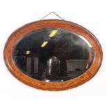 EARLY 20TH CENTURY MAHOGANY OVAL WALL MIRROR