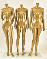 SET OF THREE GOLD FINISHED POINT OF SALE DISPLAY MANNEQUINS