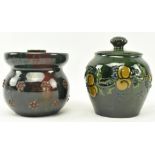 ELTONWARE POTTERY, CLEVEDON - TWO LIDDED TOBACCO JARS