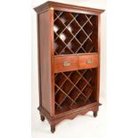 20TH CENTURY HARDWOOD WINE CABINET ON FEET