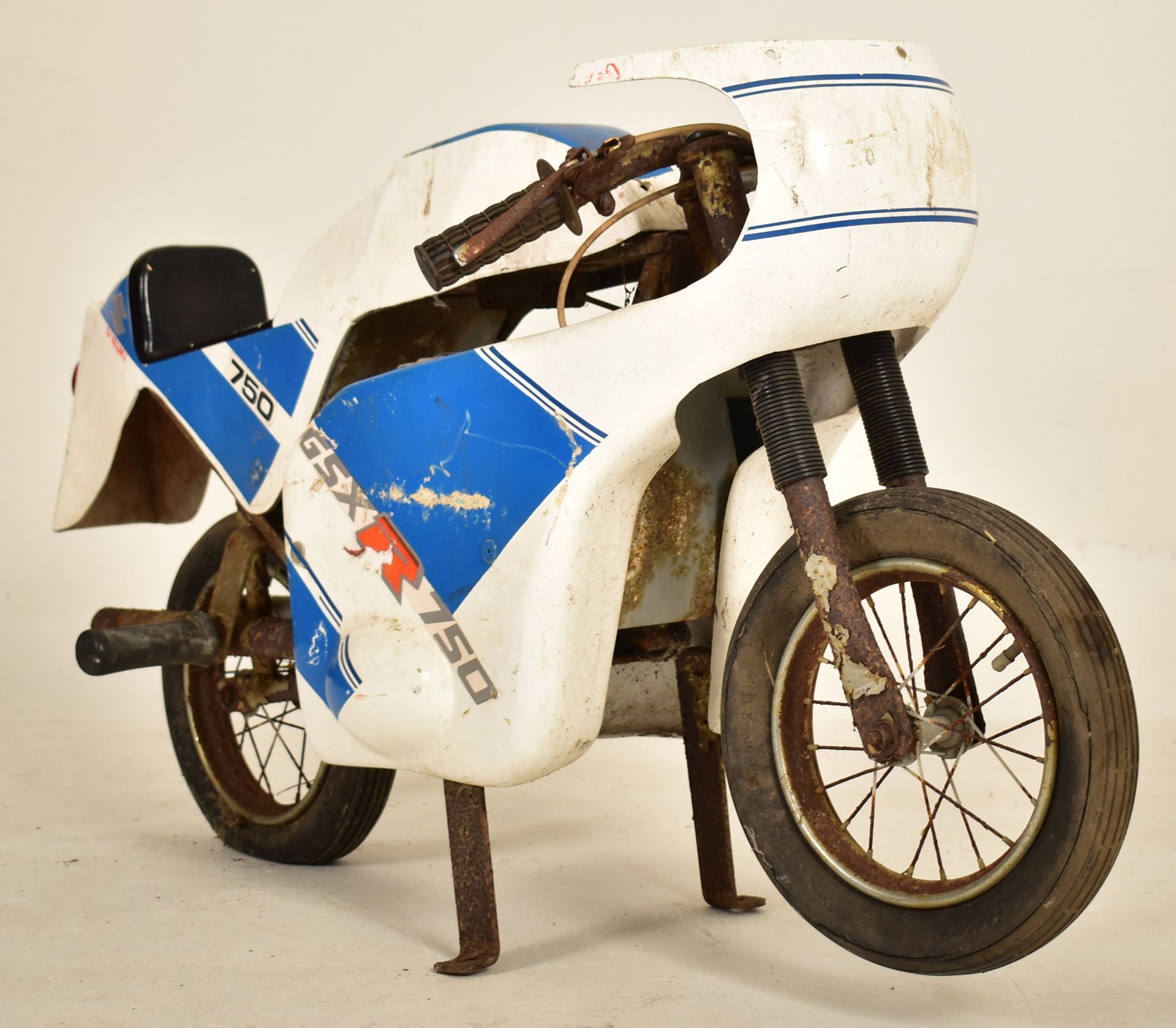 20TH CENTURY JUVENILE FAIRGROUND MOTORBIKE