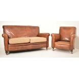 EARLY 20TH CENTURY LEATHER TWO SEATER SOFA & ARMCHAIR