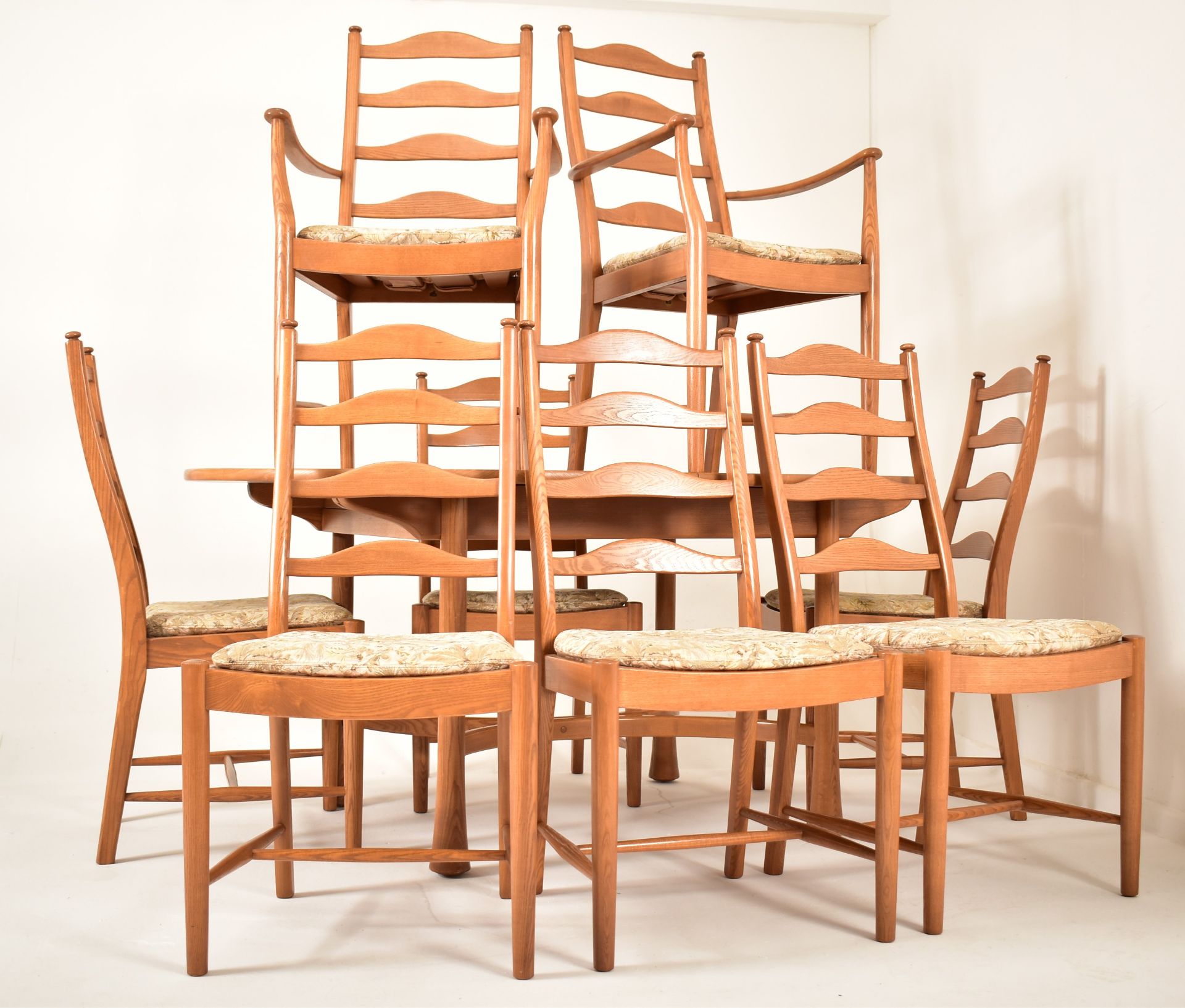 ERCOL - SAVILLE - EXTENDING DINING TABLE AND EIGHT CHAIRS