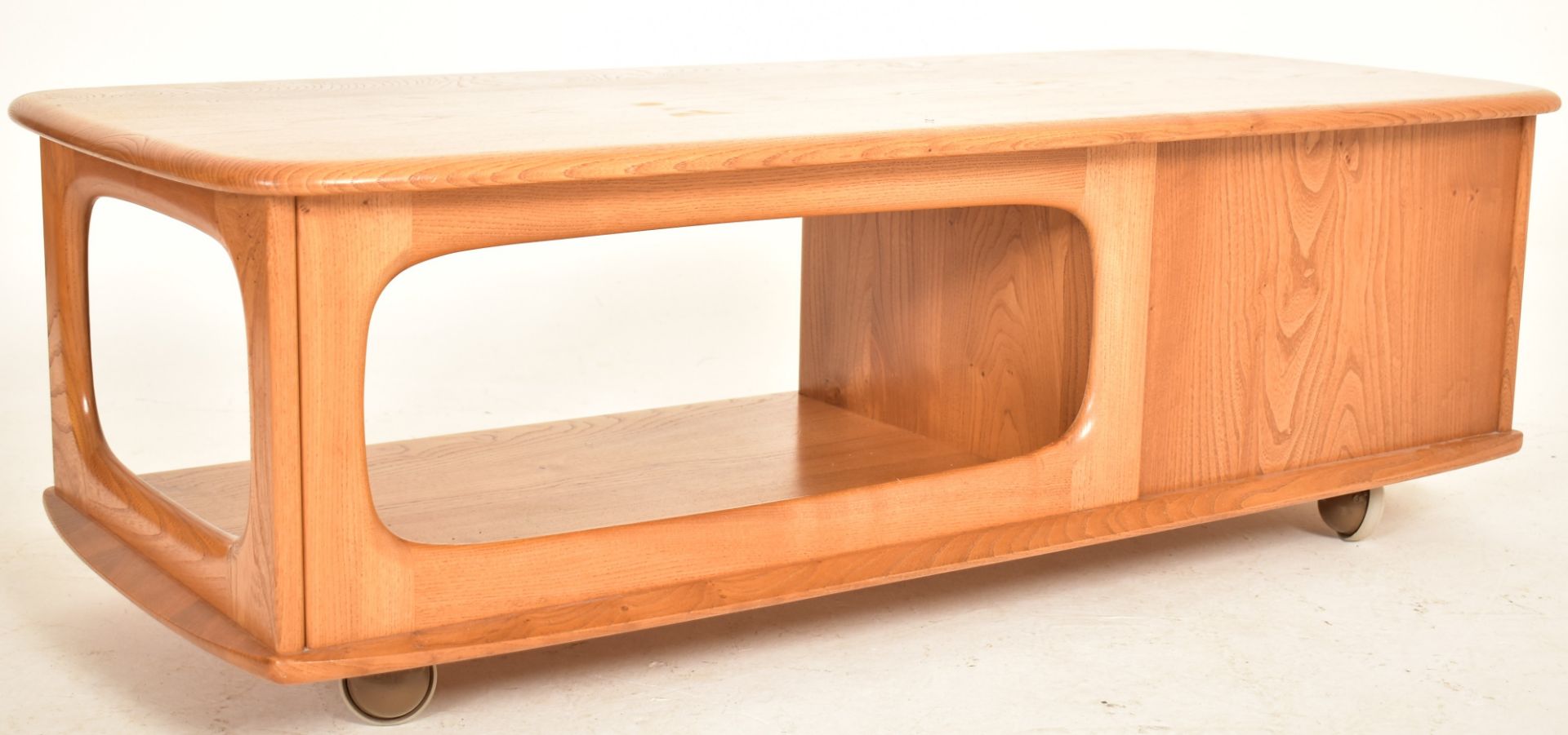 ERCOL - MINERVA - 1970S ELM COFFEE TABLE RAISED ON CASTORS - Image 6 of 6