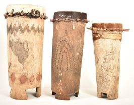 THREE LARGE AFRICAN TRIBAL WOOD & LEATHER FLOOR DRUMS