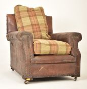 EARLY 20TH CENTURY LEATHER & BRASS STUDDED ARMCHAIR