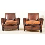 PAIR OF ART DECO LEATHER AND BRASS STUDDED CLUB ARMCHAIRS
