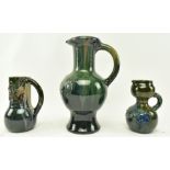 ELTONWARE POTTERY, CLEVEDON - THREE POTTERY HANDLED JUGS