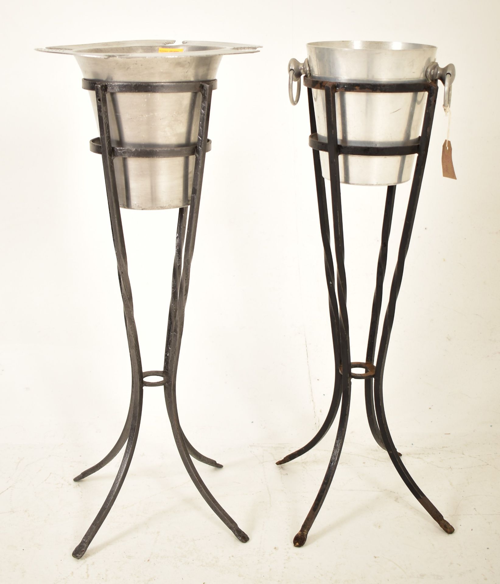 TWO RETRO 20TH CENTURY CHAMPAGNE ICE BUCKETS ON STANDS