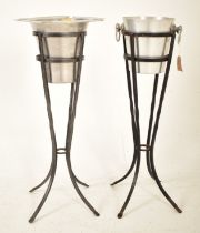 TWO RETRO 20TH CENTURY CHAMPAGNE ICE BUCKETS ON STANDS