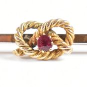 1920S 9CT GOLD & RUBY KNOT BROOCH PIN