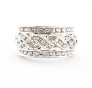 10CT WHITE GOLD & DIAMOND CROSSOVER RING