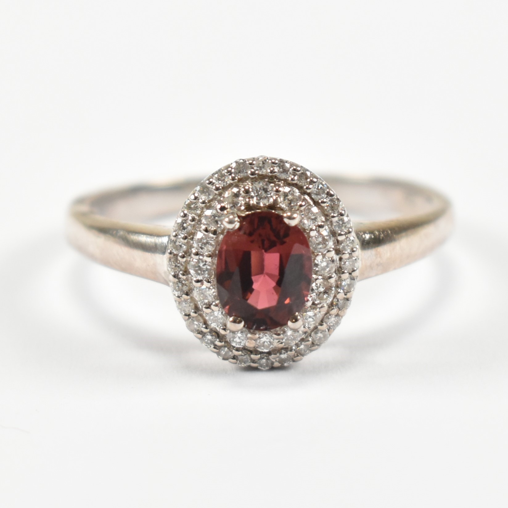 18CT GOLD TOURMALINE & DIAMOND HALO RING