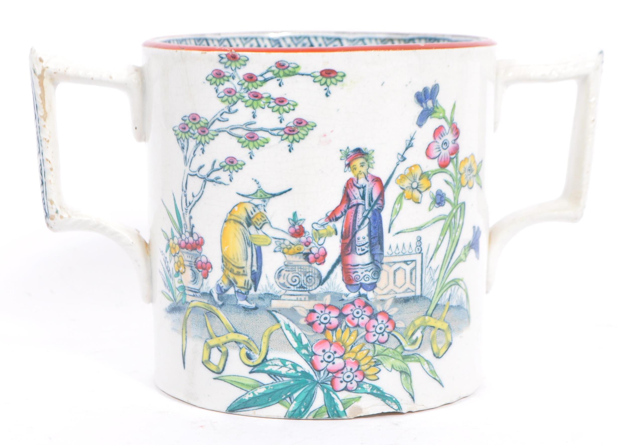 19TH CENTURY STAFFORDSHIRE TWIN HANDLED LOVING CUP