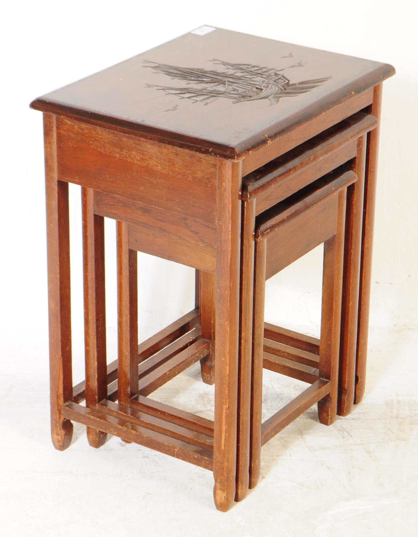 A VINTAGE 1960S CHINESE ORIENTAL NEST OF CARVED TOP TABLES - Image 3 of 6