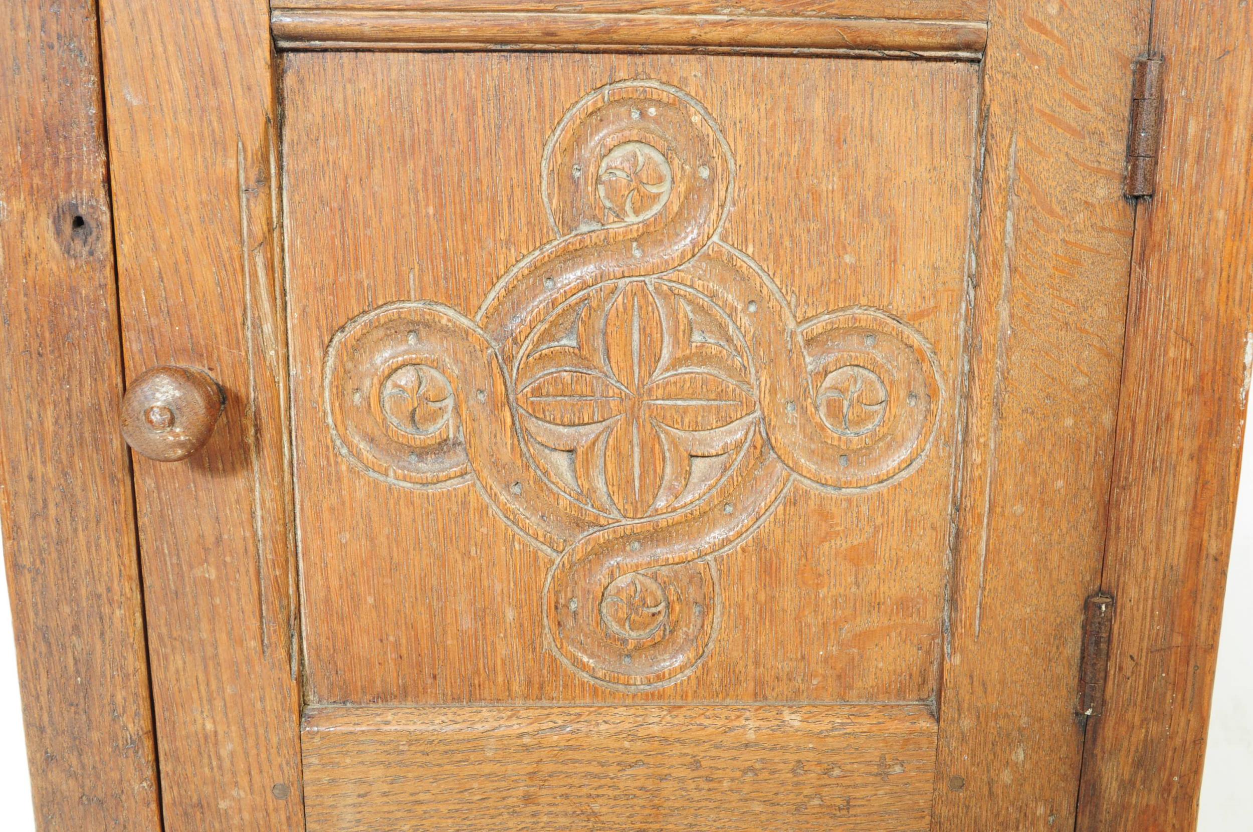 ARTS & CRAFTS CARVED OAK POT BEDSIDE CUPBOARD BY NEWMAN & CO - Image 4 of 7