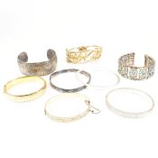 COLLECTION OF SILVER & ROLLED GOLD & COSTUME BANGLES