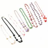 COLLECTION OF 1930s BEAD NECKLACES