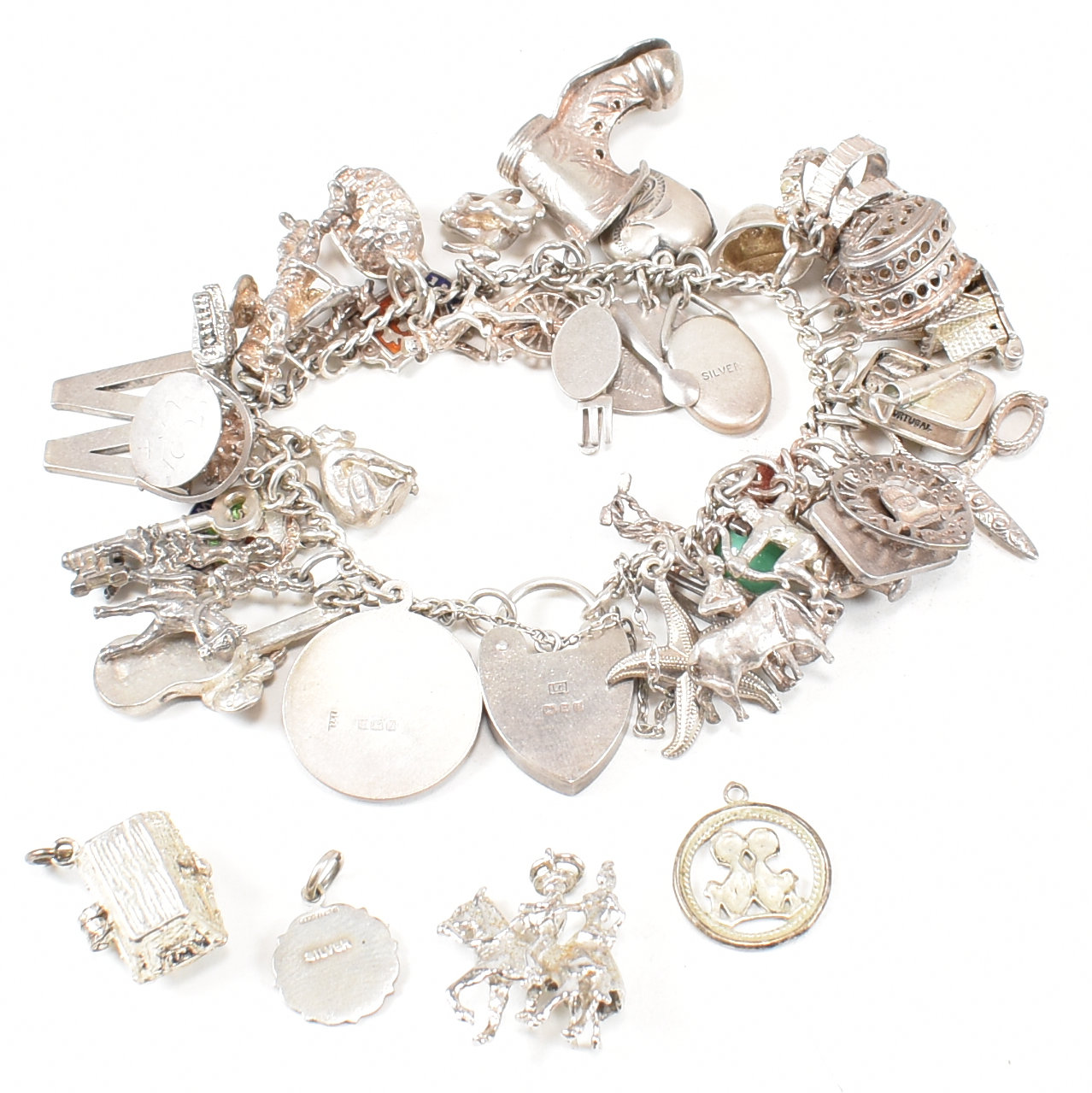 1970S HALLMARKED SILVER CHARM BRACELET WITH SILVER & WHITE METAL CHARMS - Image 2 of 4