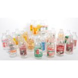 COLLECTION OF VINTAGE 1980S ADVERTISING MILK BOTTLES