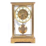 FRENCH EIGHT DAY MOVEMENT BRASS FOUR GLASS MANTEL CLOCK