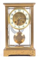 FRENCH EIGHT DAY MOVEMENT BRASS FOUR GLASS MANTEL CLOCK