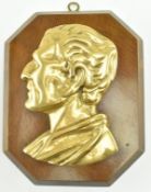 MOUNTED VICTORIAN BRASS WALL PLAQUE POSSIBLY OF SENECA
