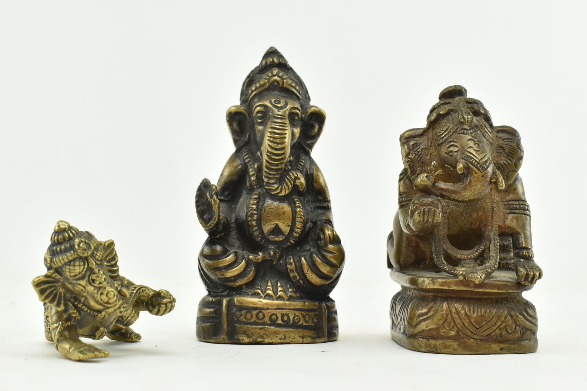 THREE HINDU BRONZE & BRASS STATUES OF THE GOD GANESHA