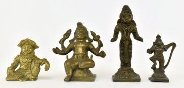 FOUR SOUTH EAST ASIAN AMULET STATUES OF HINDU DEITIES