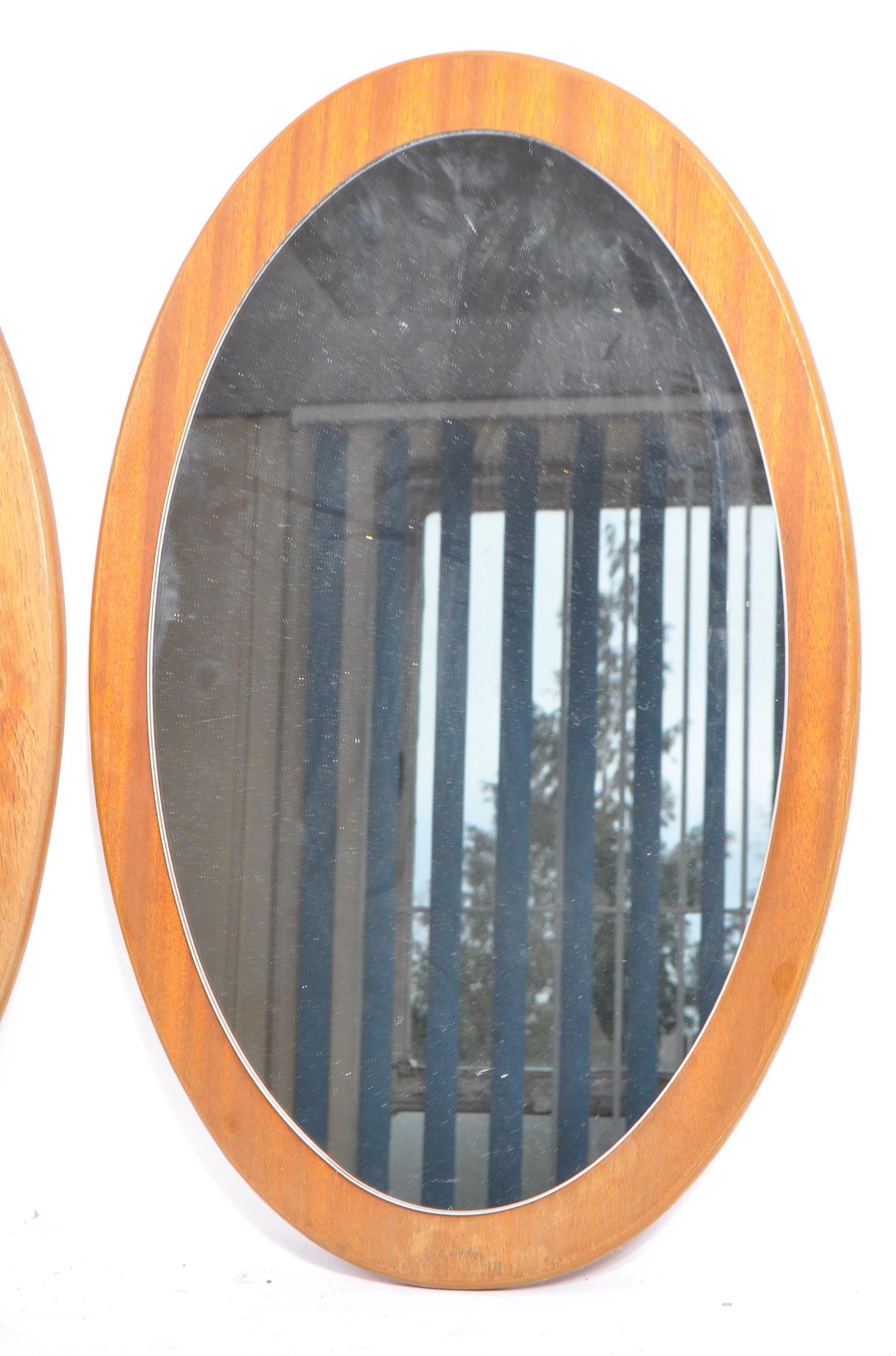 TWO MATCHING RETRO MID CENTURY 1970S TEAK FRAMED WALL MIRRORS - Image 2 of 6
