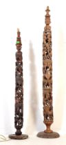 TWO MID 20TH CENTURY AFRICAN CARVED FLOOR STANDING LAMPS