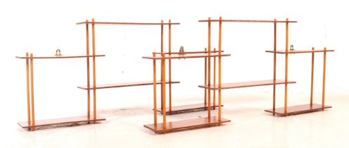 PAIR OF MID CENTURY WALL MOUNTED ETAGERE BOOKCASES