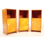 THREE MID CENTURY PLYWOOD BEDSIDE CUPBOARDS