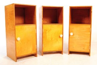 THREE MID CENTURY PLYWOOD BEDSIDE CUPBOARDS