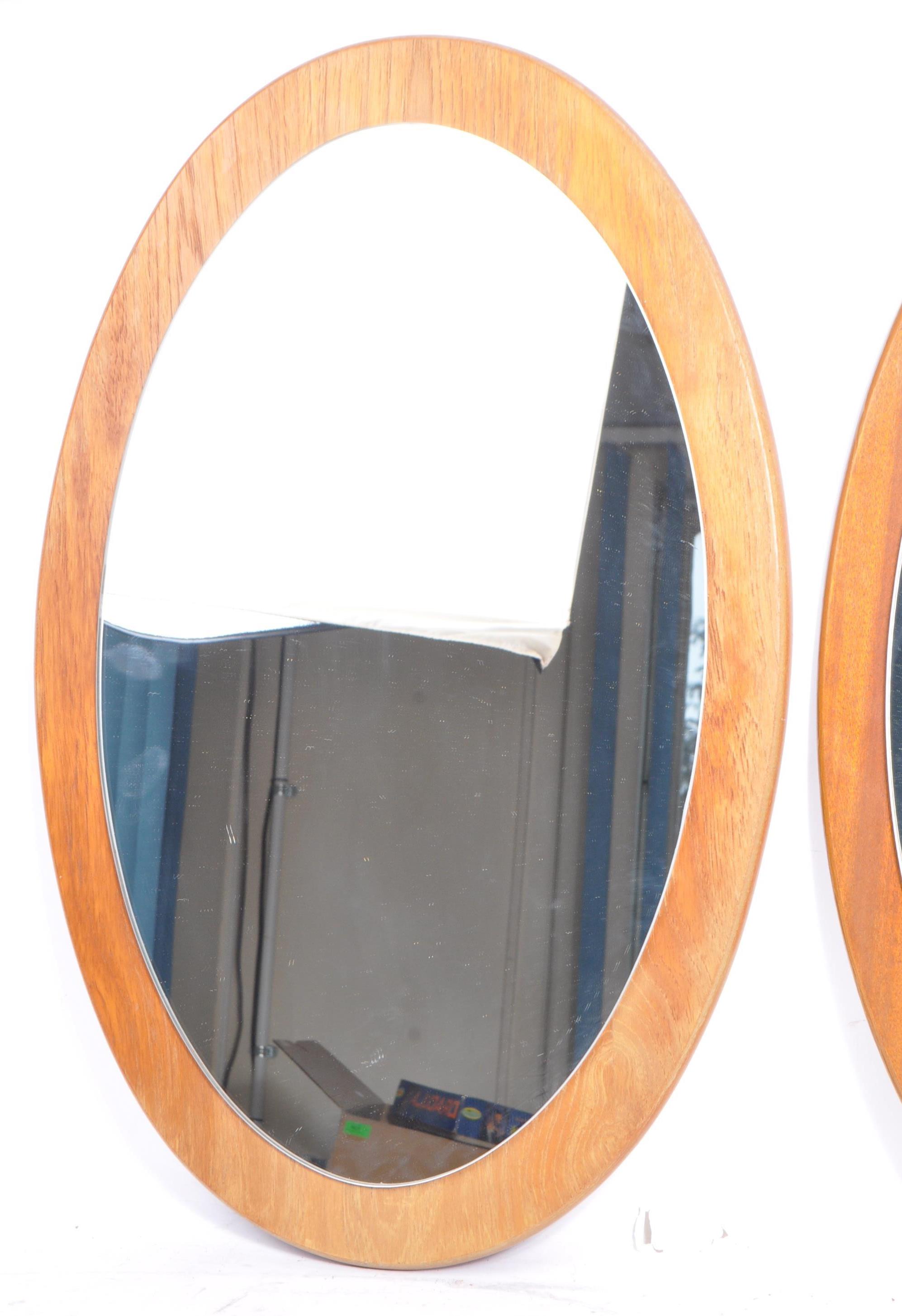 TWO MATCHING RETRO MID CENTURY 1970S TEAK FRAMED WALL MIRRORS - Image 3 of 6