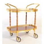 1970S GILT FRAME TWO TIER DRINKS TROLLEY