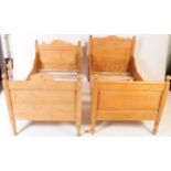 TWO 19TH CENTURY MATCHED PINE WOOD SINGLE BEDS - FRAMES