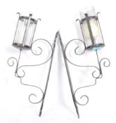 CONTEMPORARY HAND MADE IRON WALL MOUNTED CANDLE HOLDERS