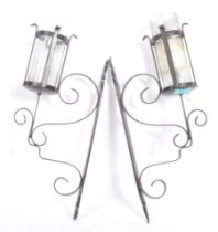 CONTEMPORARY HAND MADE IRON WALL MOUNTED CANDLE HOLDERS